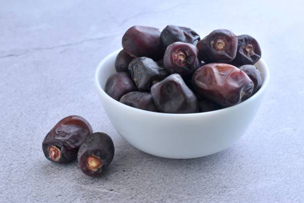 Dates in a white bowl
